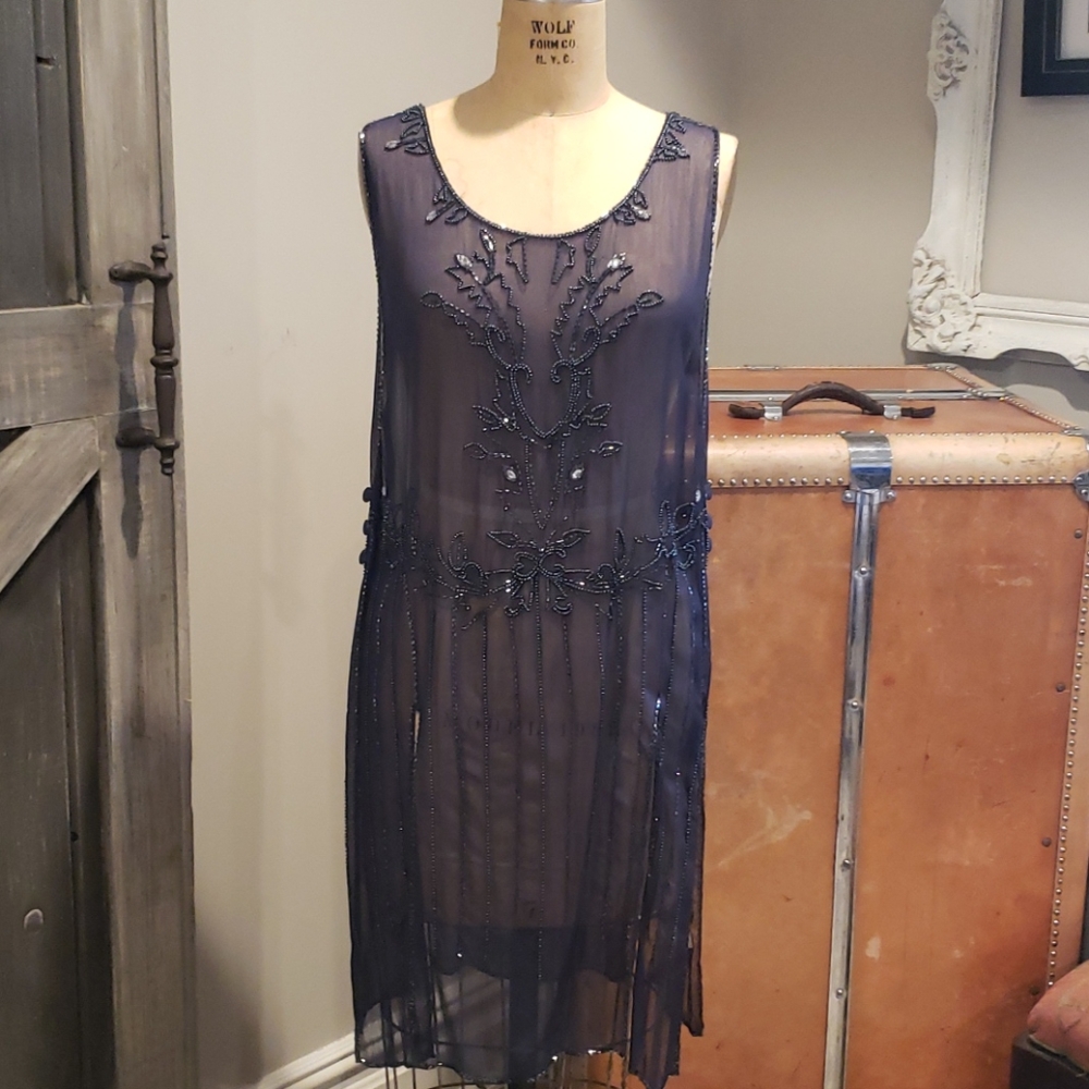 Shear blue tunic top